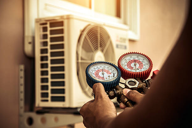 Professional Heat Pump Repair technician working in Auburn, IL
